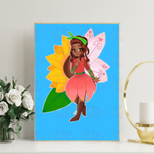 Load image into Gallery viewer, Framed artwork of a anime fairy with a sunflower behind her  on a blue background with pink hearts, displayed on a shelf with flowers and a lamp.