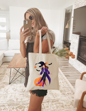 Load image into Gallery viewer, Cute Witch Halloween Tote Bag Playful Pumpkin Art Spooky Season Aesthetic Trick or Treat Bag Fall Gift for Her
