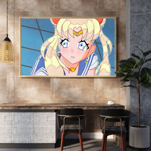 Load image into Gallery viewer, Framed anime character on a wall above a desk with chairs.