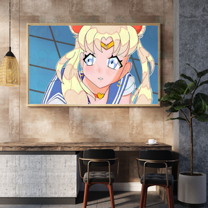 Framed anime character on a wall above a desk with chairs.